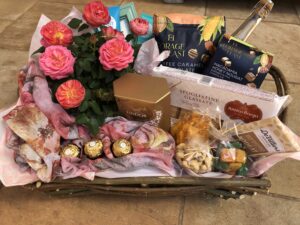 Luxury pamper hamper with roses, chocolates, and sparkling grape juice – gift delivery across South Africa